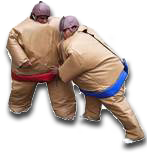 Sumo wrestlers grappling in sumo suits
