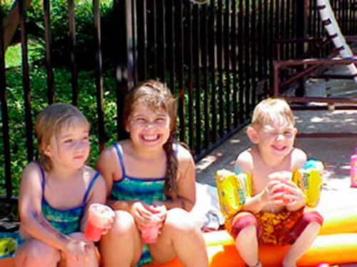 Three girls eating Sno-Kones